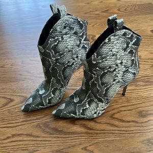 Jessica Simpson snakeskin look booties.